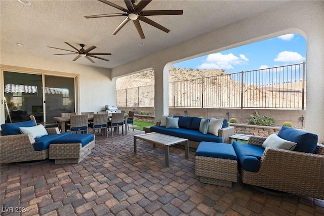 view of patio / terrace with outdoor lounge area and ceiling fan