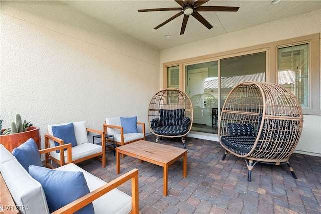 view of patio / terrace featuring an outdoor living space and ceiling fan