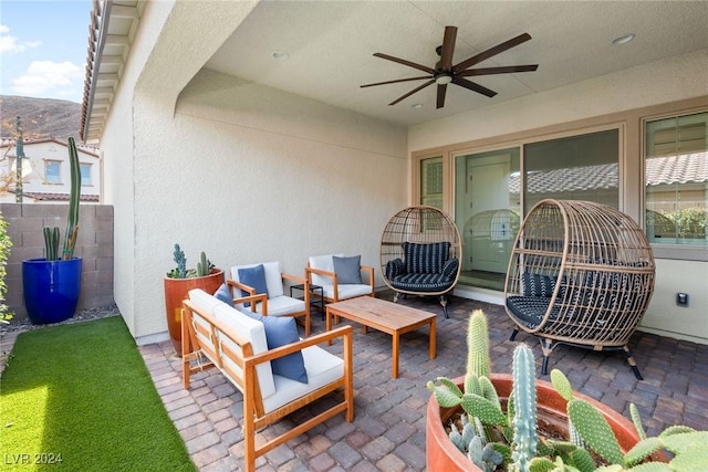 view of patio / terrace featuring ceiling fan