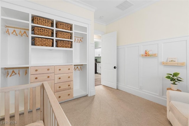 interior space featuring light carpet and ornamental molding