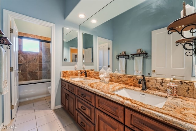 full bathroom featuring tile patterned flooring, vanity, toilet, and combined bath / shower with glass door