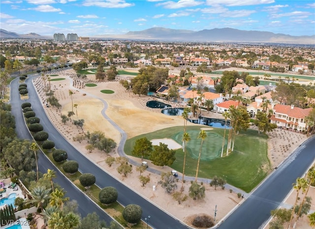 birds eye view of property featuring a mountain view