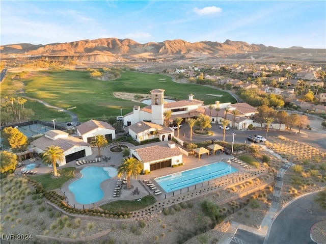 bird's eye view featuring a mountain view and view of golf course