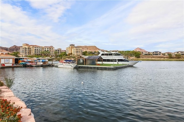 view of water feature with a dock