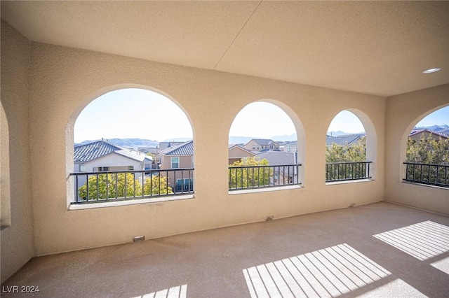 exterior space with a textured ceiling