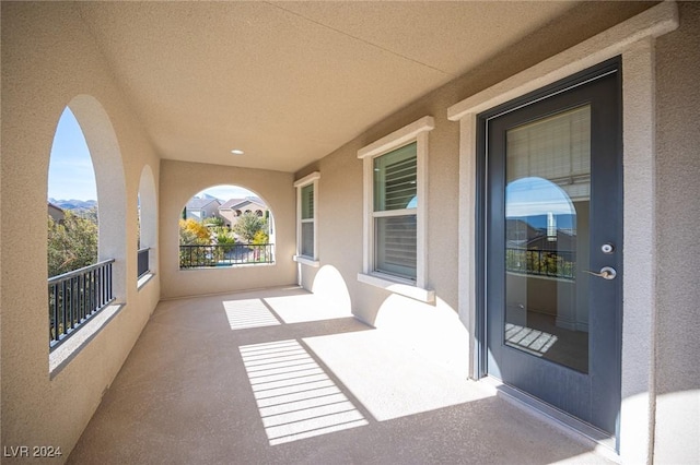 view of patio / terrace with a balcony