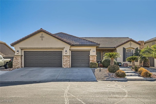 view of front of property with a garage