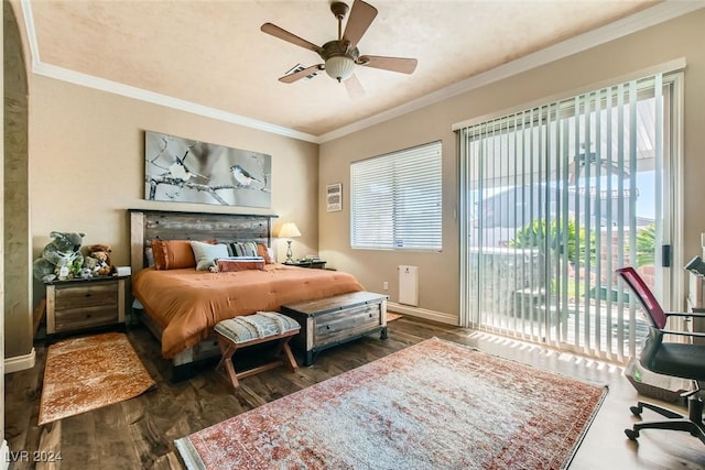 bedroom featuring multiple windows, access to outside, and dark hardwood / wood-style floors