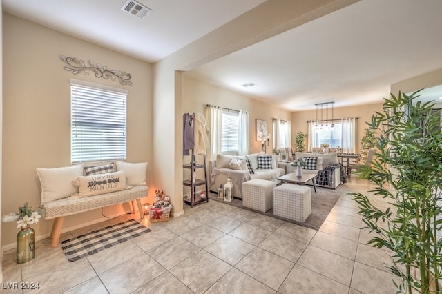 living room with light tile patterned flooring