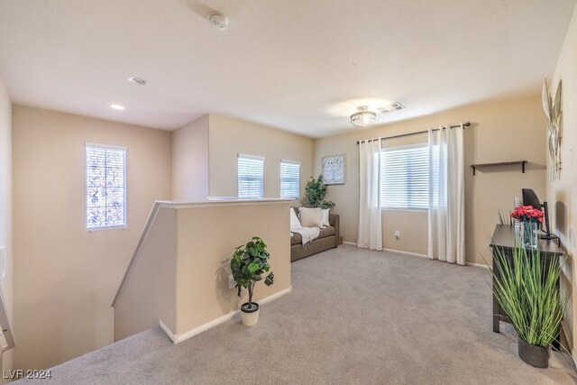 sitting room with light carpet