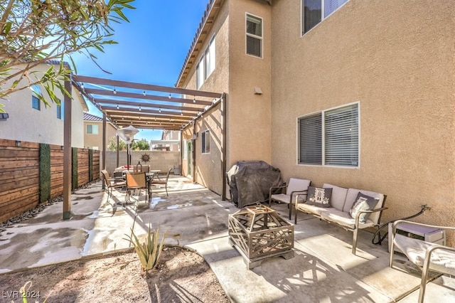 view of patio featuring a grill and an outdoor living space