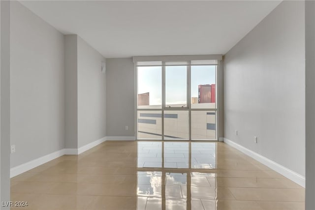 view of tiled spare room