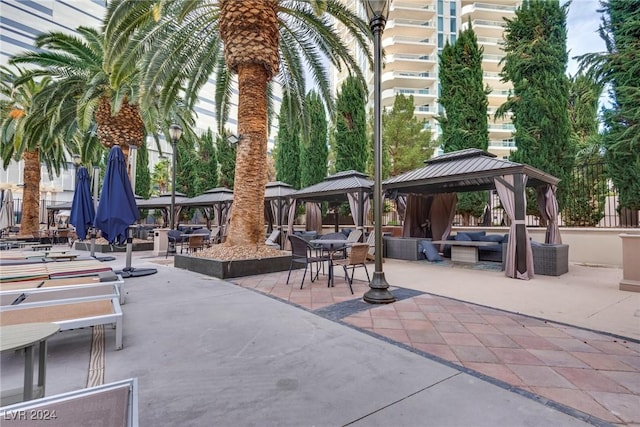 view of community with a patio area and a gazebo