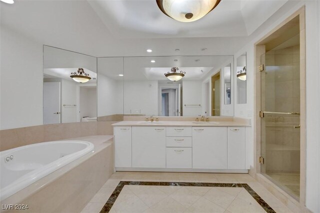 bathroom with vanity, tile patterned floors, and independent shower and bath