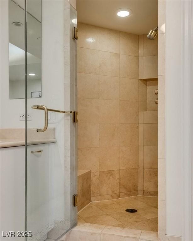 bathroom featuring a shower stall