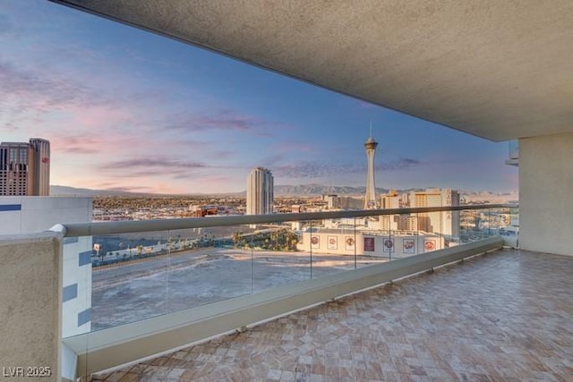 balcony featuring a city view