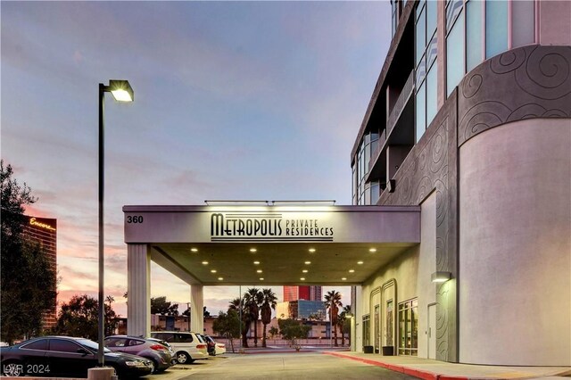 view of outdoor building at dusk