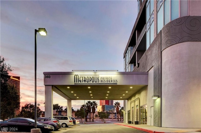 360 E Desert Inn Rd Unit 1402, Las Vegas, NV 89109 - property at dusk with uncovered parking