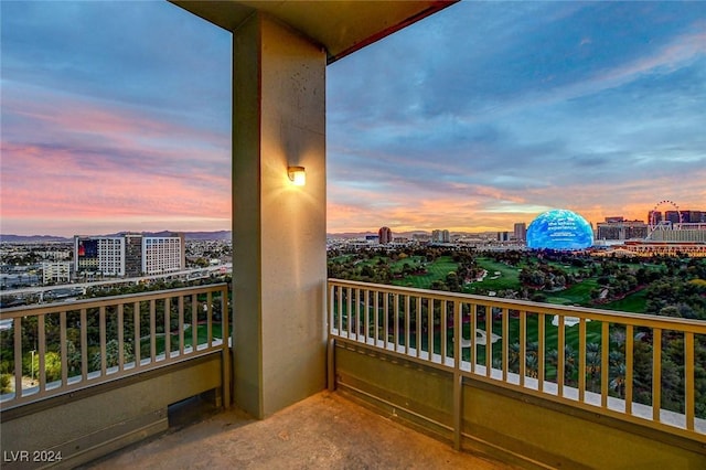 view of balcony at dusk