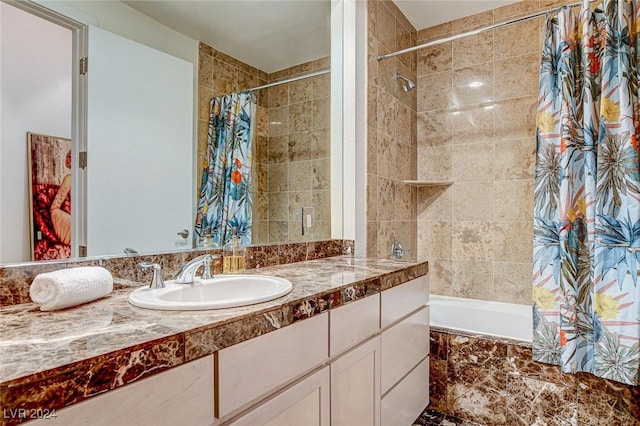 bathroom featuring vanity and shower / bath combo