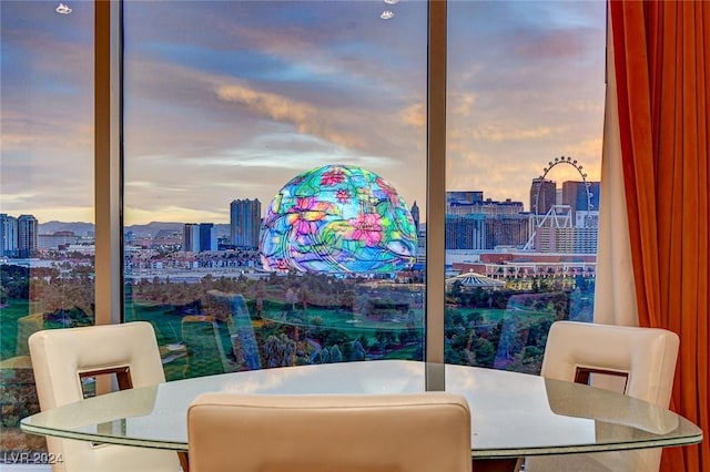 360 E Desert Inn Rd Unit 1402, Las Vegas, NV 89109 - dining area with a skyline view