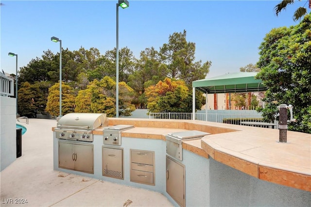 360 E Desert Inn Rd Unit 1402, Las Vegas, NV 89109 - view of patio featuring area for grilling and a gazebo