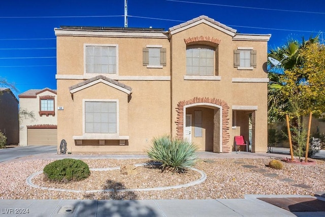 view of front of home featuring a garage