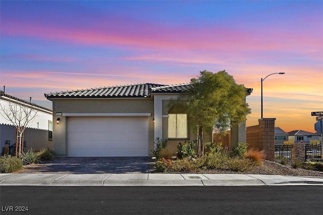 view of front of house with a garage