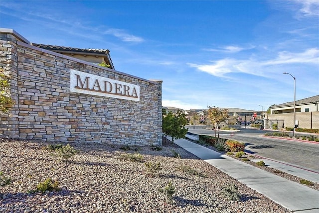 view of community sign