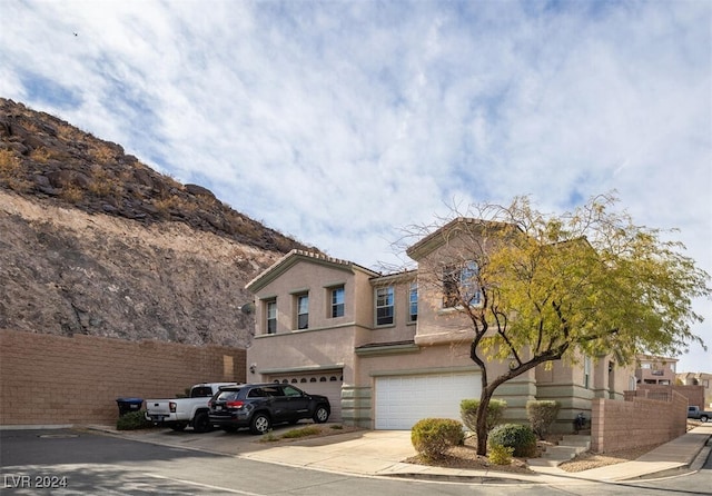 view of front of home with a garage