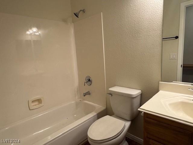 full bathroom with shower / bathing tub combination, vanity, and toilet