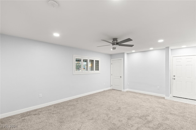 carpeted empty room with ceiling fan