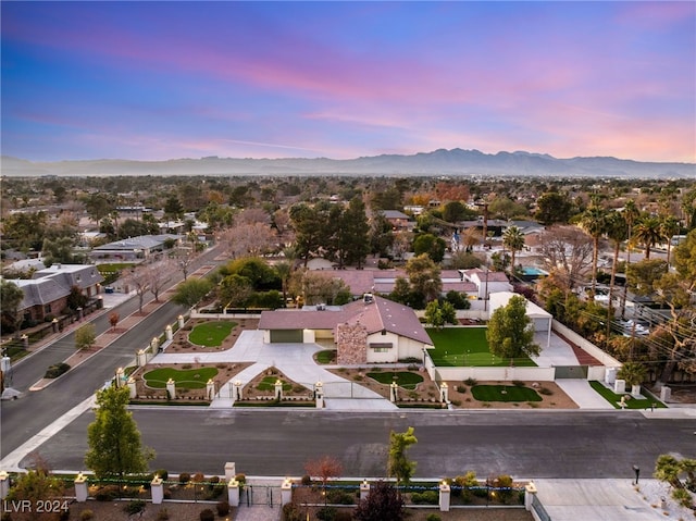 aerial view at dusk with a mountain view