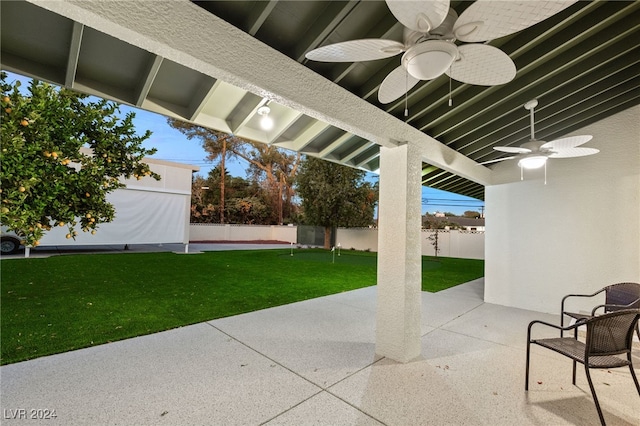 view of patio featuring ceiling fan