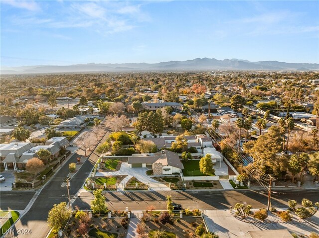 drone / aerial view featuring a mountain view