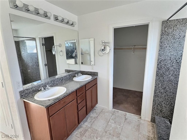 bathroom featuring vanity and walk in shower