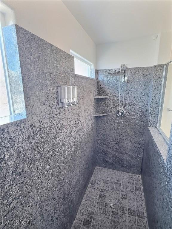 bathroom featuring a shower