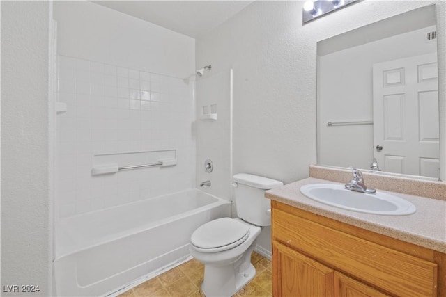 full bathroom featuring vanity, toilet, and washtub / shower combination