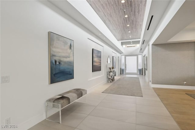 hallway with light tile patterned flooring