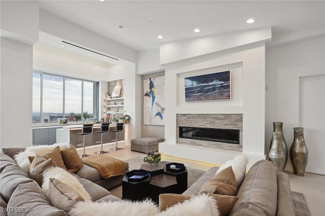 living room featuring a fireplace