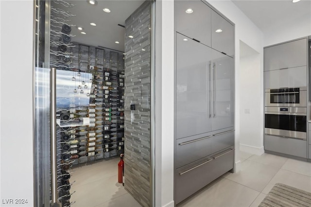 wine cellar featuring light tile patterned floors