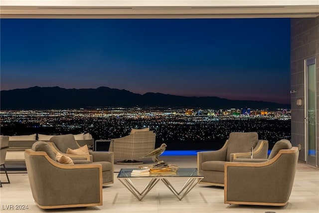 view of patio terrace at dusk