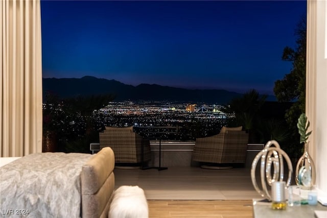 view of balcony at twilight