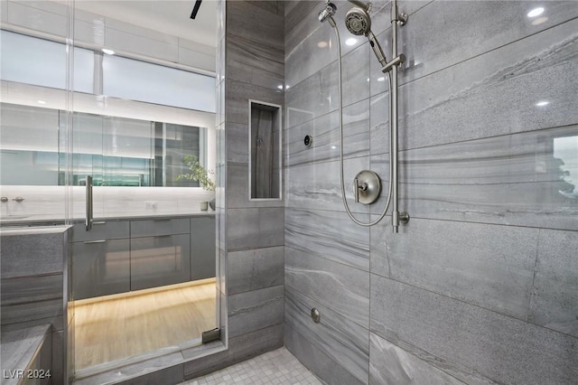 bathroom featuring an enclosed shower