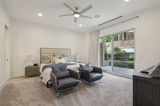 carpeted bedroom with access to exterior and ceiling fan