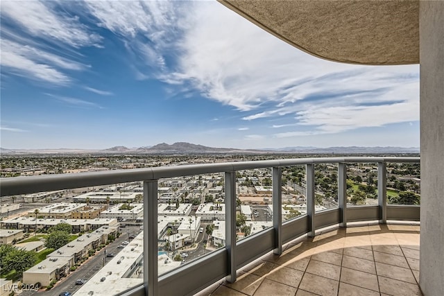 balcony featuring a mountain view