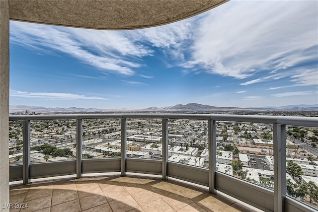 balcony featuring a mountain view