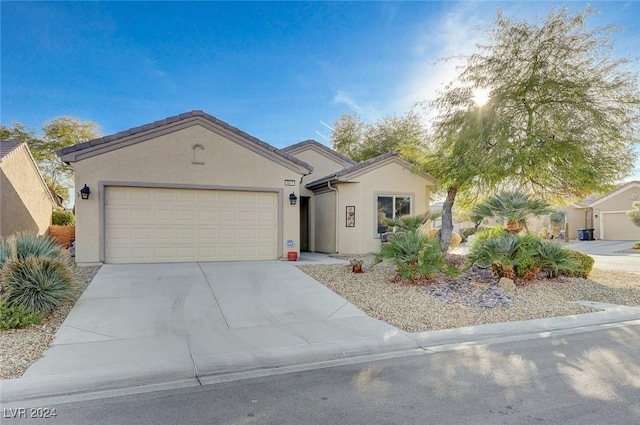 ranch-style home with a garage