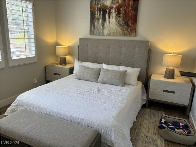 bedroom featuring hardwood / wood-style flooring