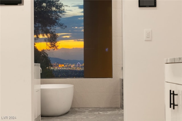 bathroom with tile walls